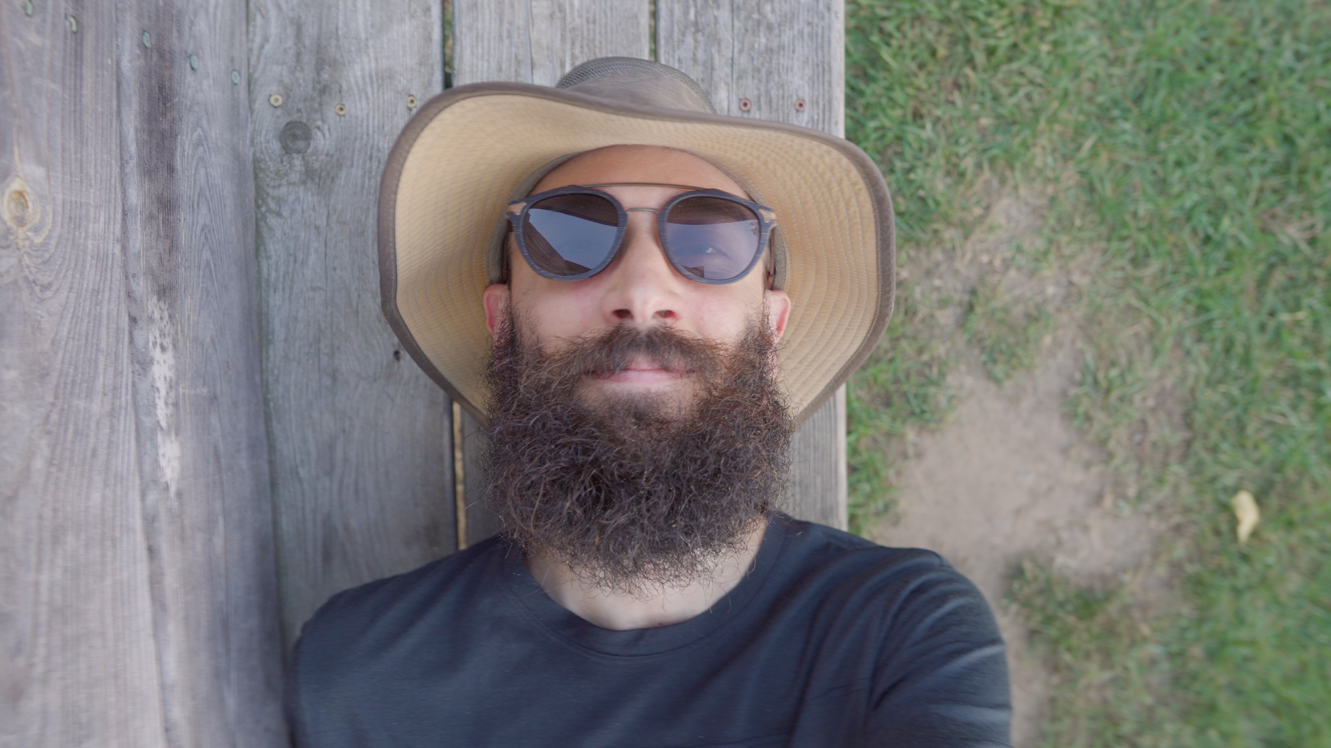 Shwood Kinsrow Lifestyle Sunglasses Review Walnut Wood Metal Vintage Design Sustainable Lying Down Bench Selfie